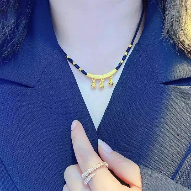 

New curved tube bell pendant necklace for women with tassels and lucky beads in yellow gold - a high-end and stylish neck chain