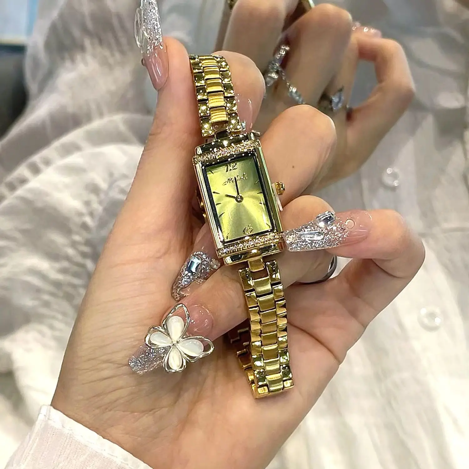 Quadratische Damenarmbanduhr mit Stahlarmband im gleichen Stil، ein modisches und luxurieszes Accessoireleri Damen. #5