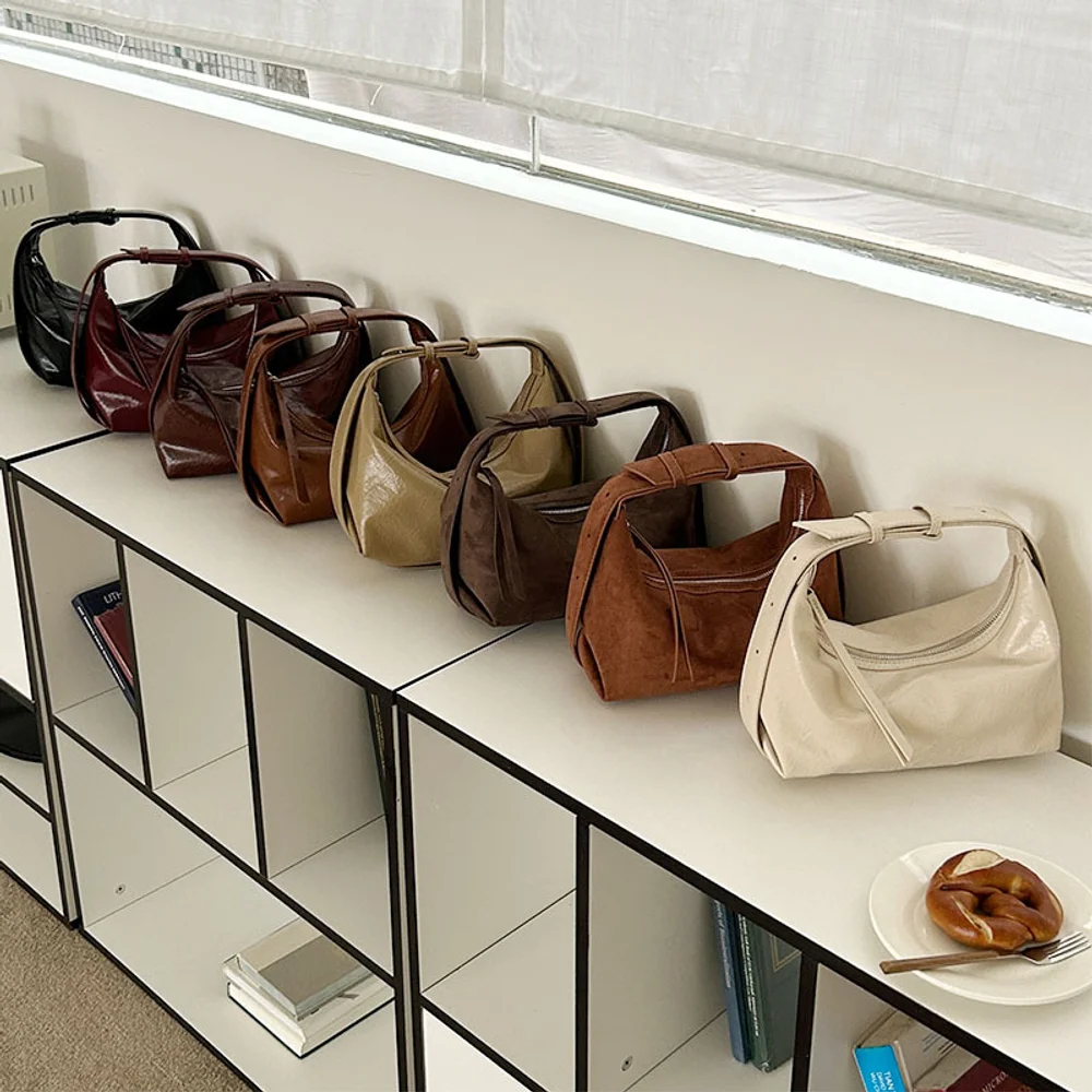 

Korean niche design, light luxury small handbag, high-end handbag, women's commuting armpit, shoulder, crossbody, dumpling bag