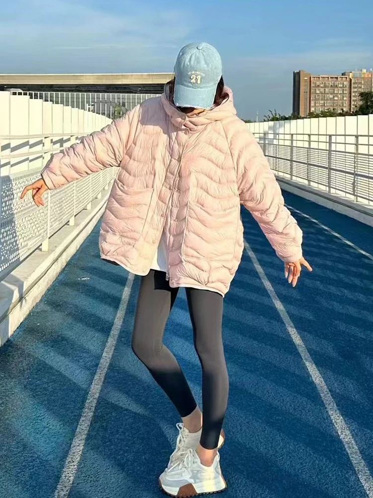 Piumino invernale leggero e ampio con cappuccio da donna Piumino d'anatra bianco soprabito Parka caldo monopetto femminile