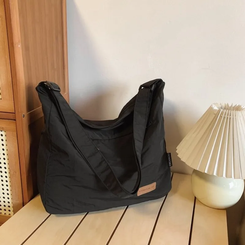 

Washed cloth bag Large capacity bag Women's new trendy fashion tote bag Versatile couple shoulder commuter bag