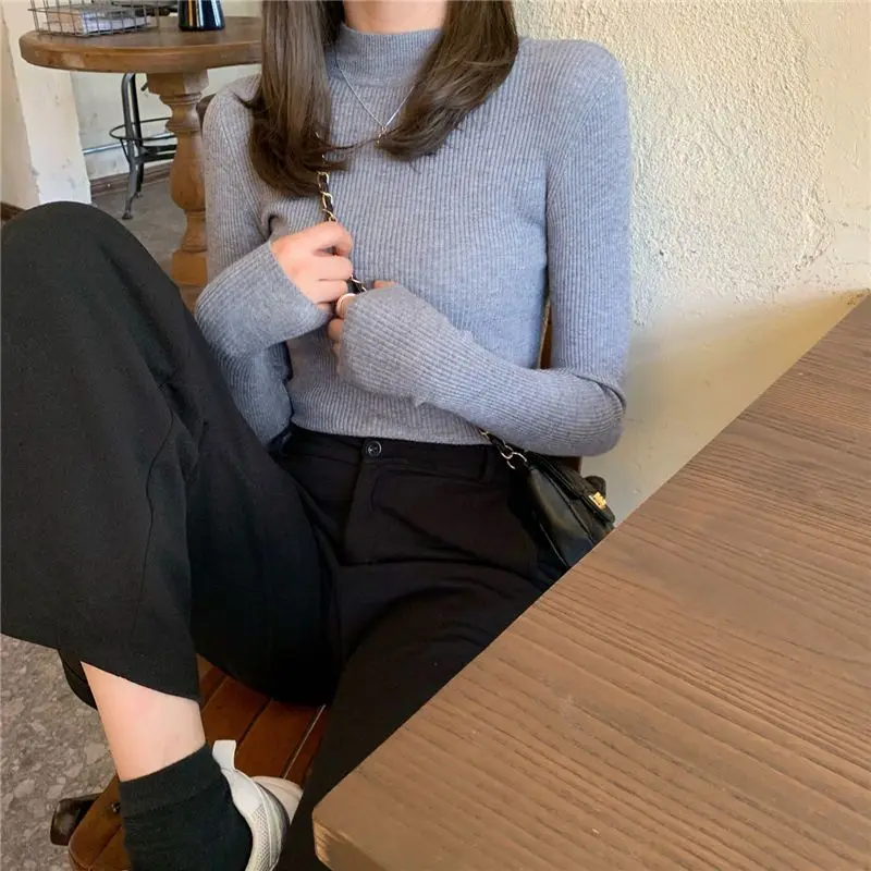 

Half high neck solid color knitted sweater women autumn 2026 new slim fit top stylish interior knitted sweater trend Pullovers