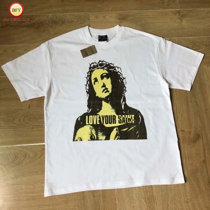 

25SS SAINT Minimalist White Streetwear Cartoon Print T-Shirt High Street Oversized Summer Men's Women's Couples T-Shirt