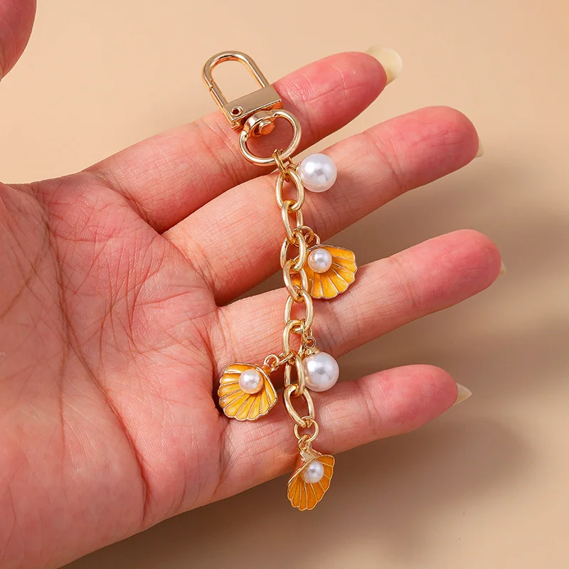 Aihua Niedlicher Schlüsselanhänger Y2K Sommer Strand Perle Muschel Schlüsselanhänger für Frauen Mädchen Handtasche Anhänger Schlüsselanhänger Ozean Urlaub Schmuck Geschenk – Detail 4
