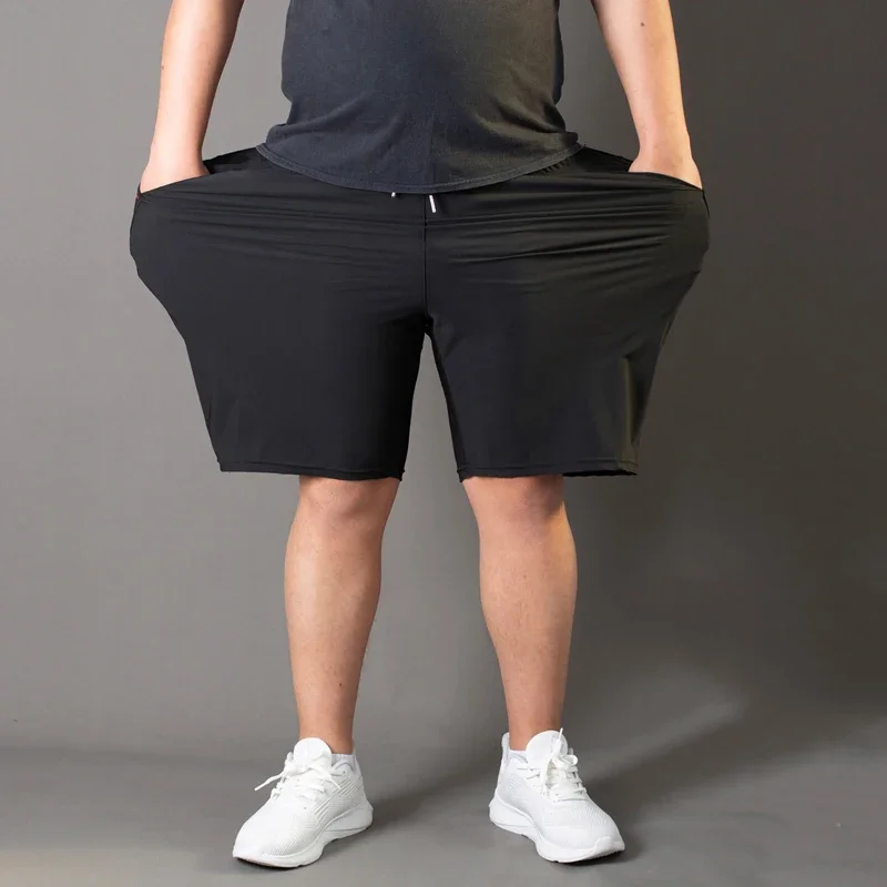 الرجال حجم كبير السراويل غير رسمية 6XL 7XL حجم كبير رياضة السراويل الرجال بسط الصيف الشاطئ سراويل قصيرة سريعة الجافة تنفس الذكور الملابس