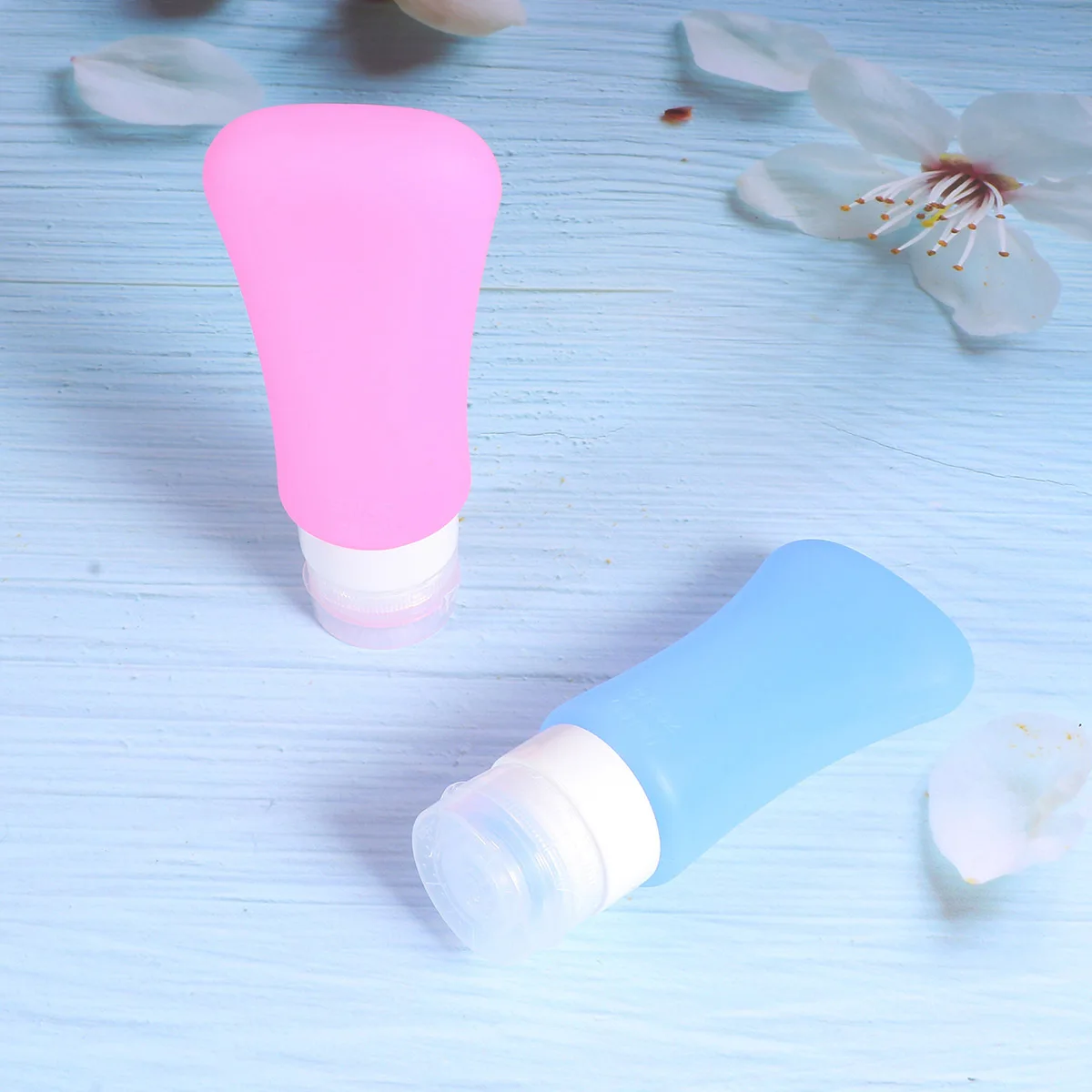 2Pcs Travel Silicone Bottles Refillable Leakproof Portable Empty Mini Dispenser Makeup Skin Pink