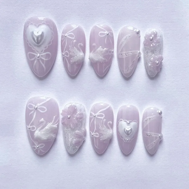 

24 Pcs Realistic Fake Nails Set 3D Swan Heart Bow Artificial False Nails with Glue Almond Summer Press on Nails with Charms 2025