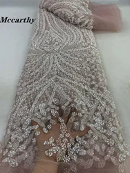 豪華なアフリカのスパンコールのついたレースの生地,結婚式のための真珠の刺繍が施された高品質の生地,ナイジェリア,フランスのチュール,zx70km,2024