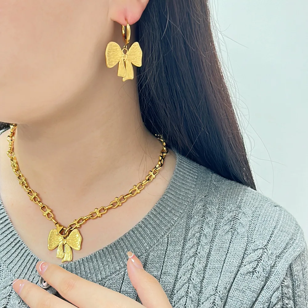 

DIY accessories 316 Earrings Titanium Steel Bow Earrings Pendant Necklace Set Fashion 18K Gold Earrings Necklace Hot Selling Ear