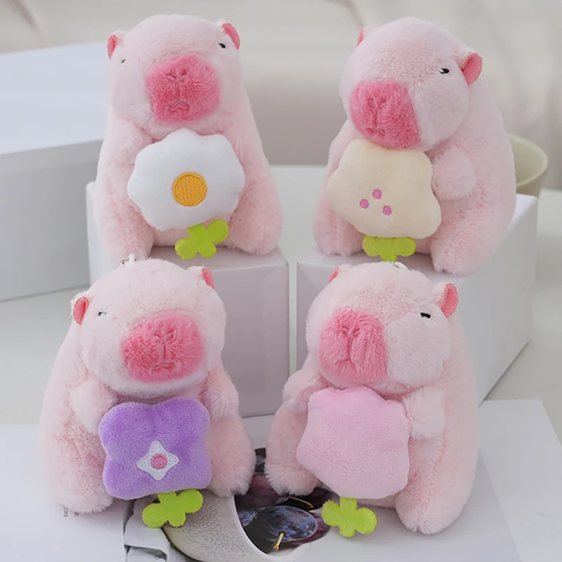 1PC Cartoon Pink capibara con fiori che abbracciano peluche bambola di pezza portachiavi zaino borsa per auto ciondolo Decor Gift