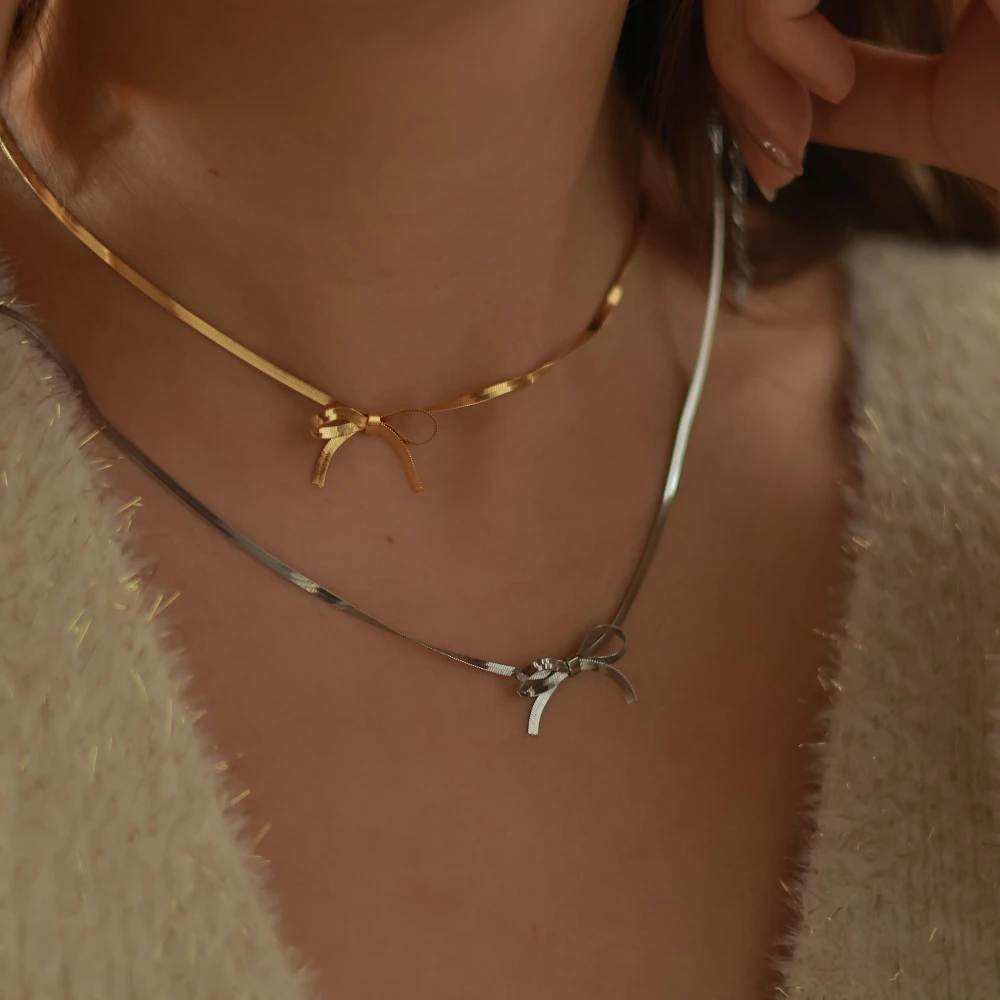 

Bow necklace choker neck chain snake bone small fresh charm women's necklace 18K gold color preservation