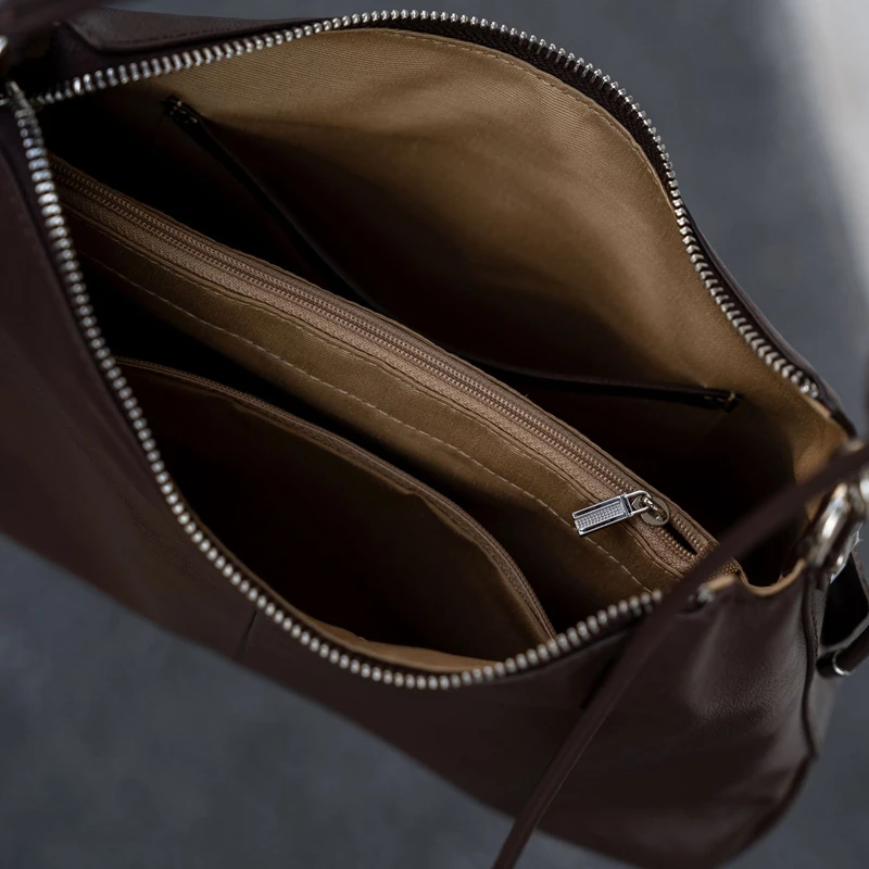 Hifashion خمر البقرة جلد طبيعي لينة المتشرد حقائب كتف للنساء 2025 الفاخرة مصمم نصف القمر Crossbody حقائب سيدات