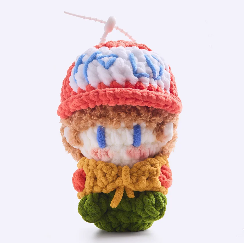 Celebrity merchandise: gummy candies, handmade crocheted dolls, keychains, and concert support materials/merchandise.