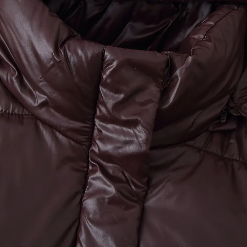 Zimowa nowa damska kurtka bawełniana o luźnym kroju, zapinana na zamek, z długim rękawem, stójką, kapturem, błyszcząca, typu kurtka chlebowa.