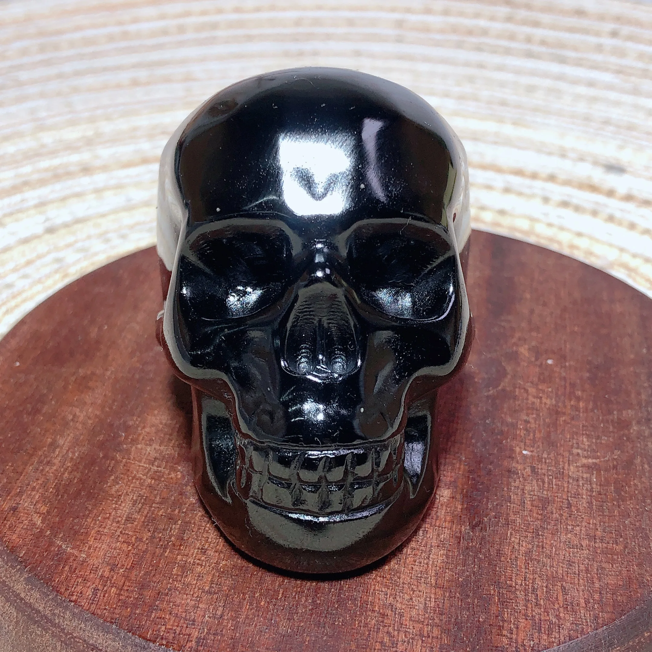 

Natural Crystal Black Obsidian Skull Painting Stone Polished Energy Wholesale Home Decoration Energy Ore