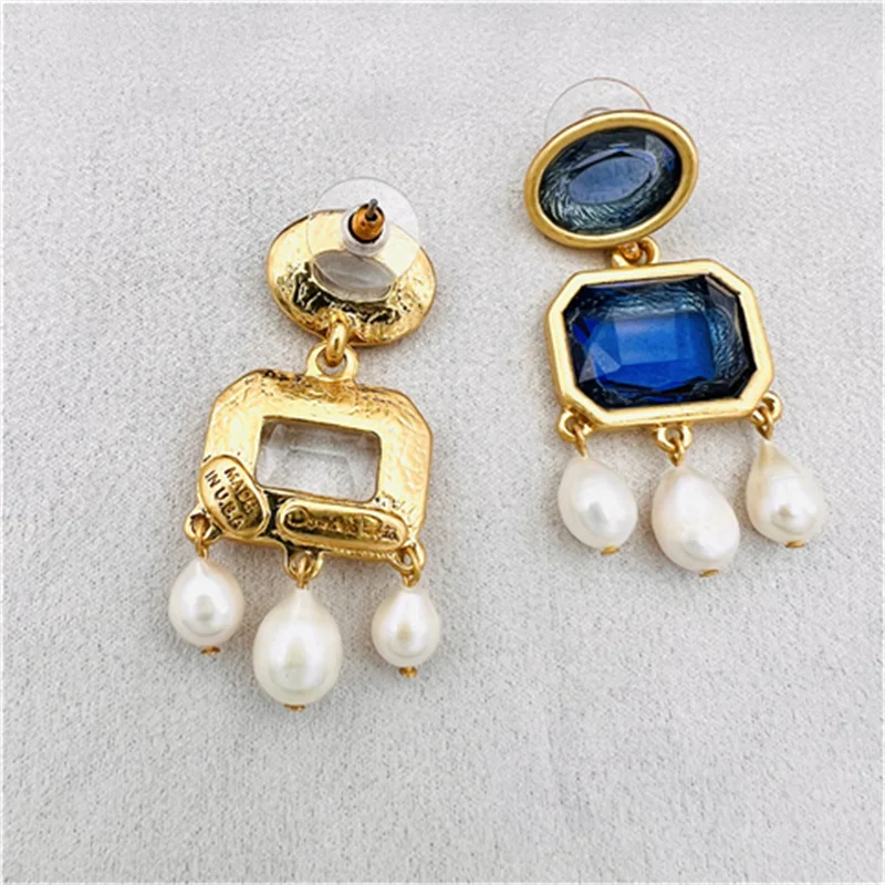 The European and American style new crystal senior feeling small freshwater pearl tassel shape earrings