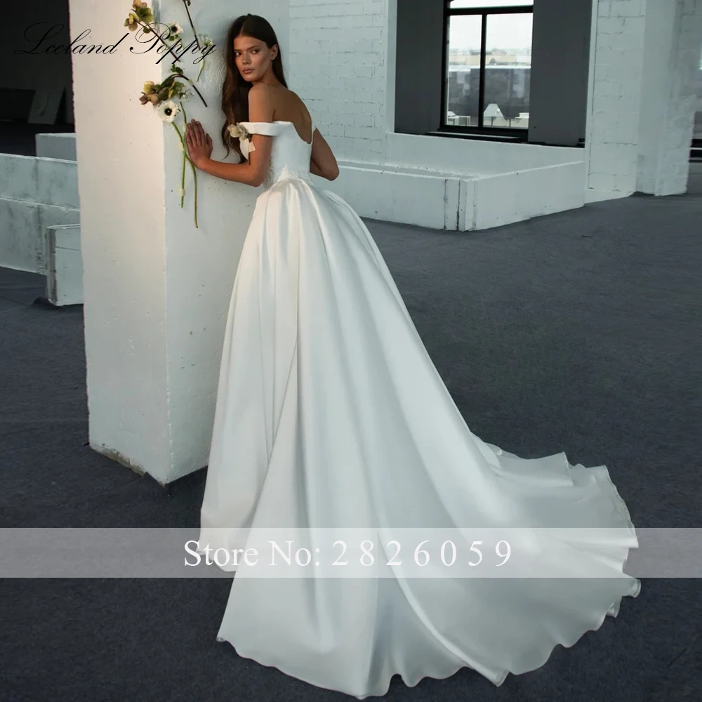 Lceland Poppy Customized A Line Satin Wedding Dresses Floor Length Sleeveless Pearls Beaded Bridal Gowns with  Court Train