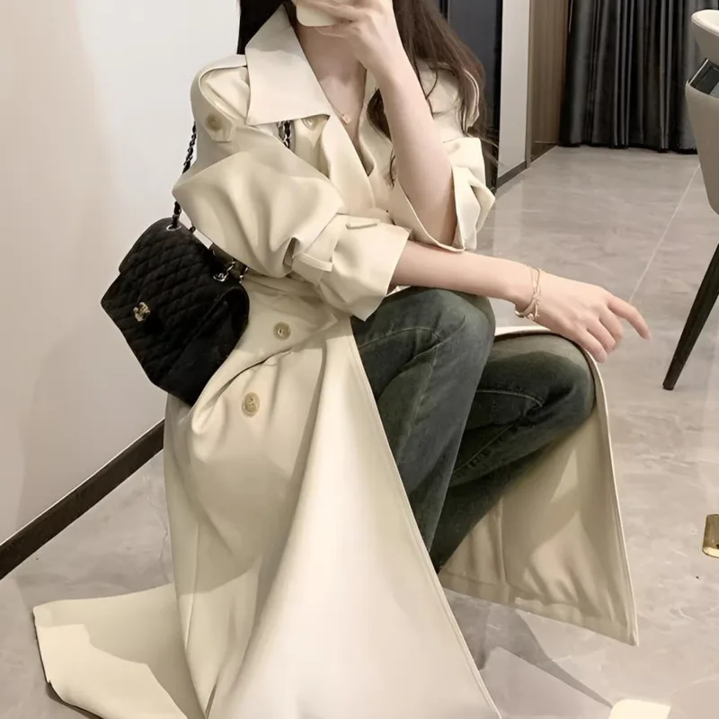 เสื้อโค้ทยาวทรงเทรนช์โค้ทสำหรับผู้หญิง EAEOVNI สไตล์ลำลองสำหรับใส่ทำงาน สีพื้น ติดกระดุม มีเข็มขัด  แฟชั่นฤดูใบไม้ร่วงปี 2025 เสื้อผ้าใหม่