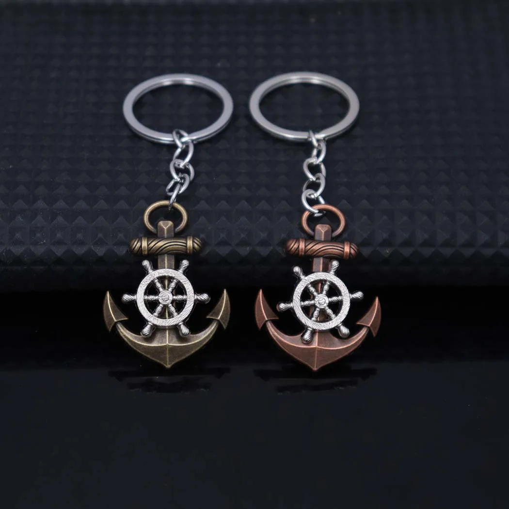 New style fashionable zinc alloy anchor and rudder pendant keychain hanger for men and women, creative bag accessory, car keycha