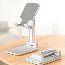 Phone holder on desk with smartphone for video calls and streaming