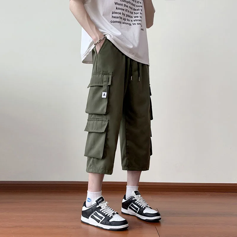 

Fashion Solid Color Spliced Pockets Casual Pants Men's Clothing 2025 Summer New Loose Young Style Elastic High Waist Cargo Pants