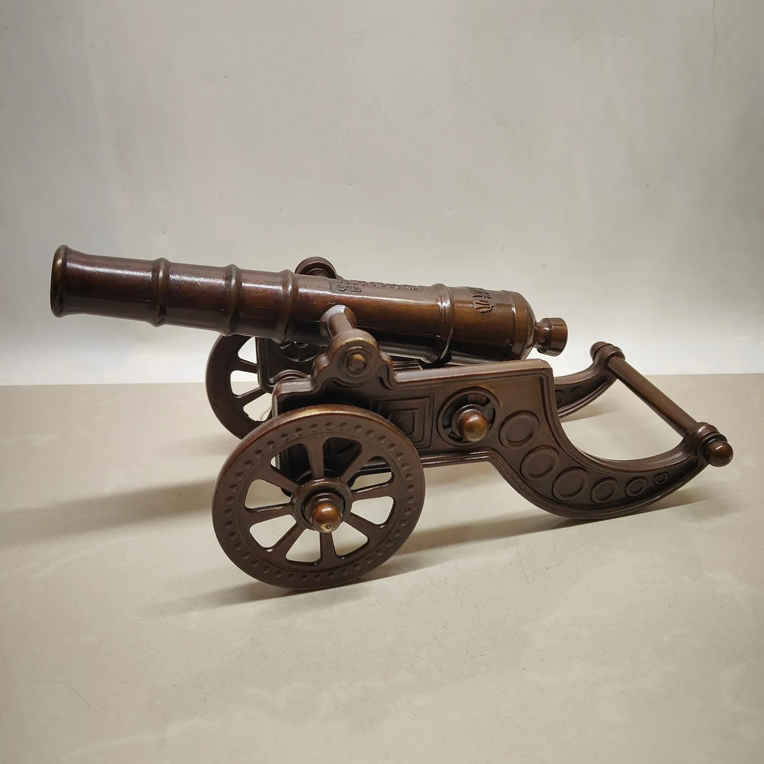 A large decorative cannon used for warding off evil spirits and protecting the home.,Free shipping