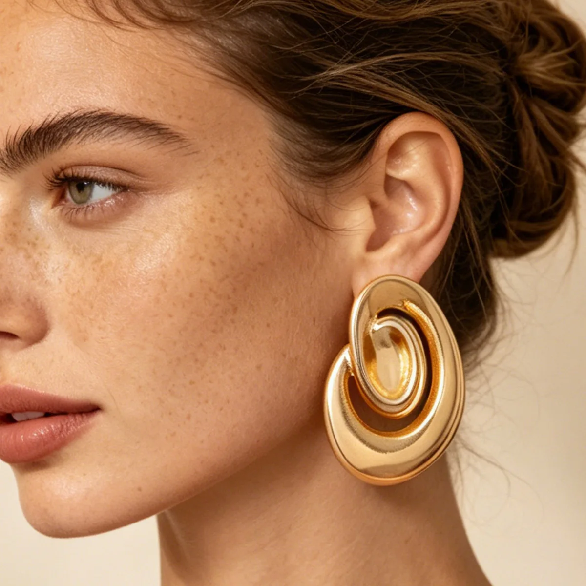 Vintage elegance, fashionable spiral metal texture, light luxury earrings, niche sophistication, and high-end style for commuter