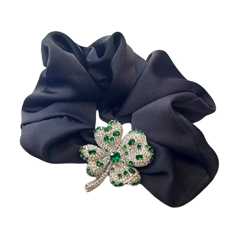 

Four-leaf clover black satin hair band, ponytail headband, rhinestone headdress.