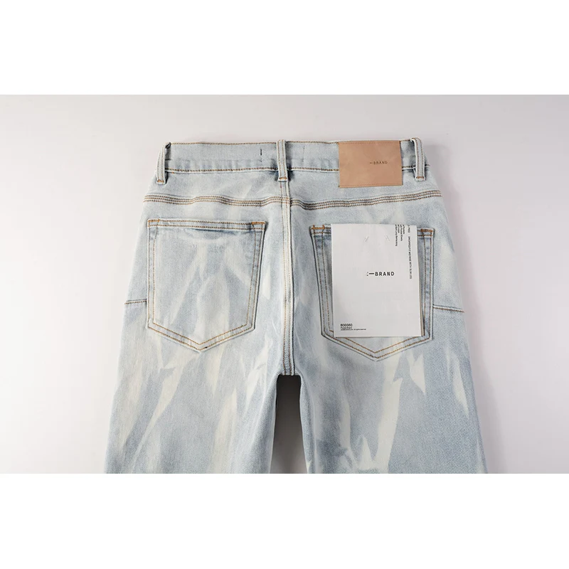 Jins Denim jalanan pria, celana Jeans sobek kancing kurus biru muda, jalanan tinggi Distressed