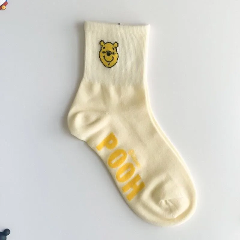 Mercancía de anime Pato Donald Mickey calcetines lindos de verano de dibujos animados de alto valor personalidad de barril medio parejas calcetines de moda versátiles
