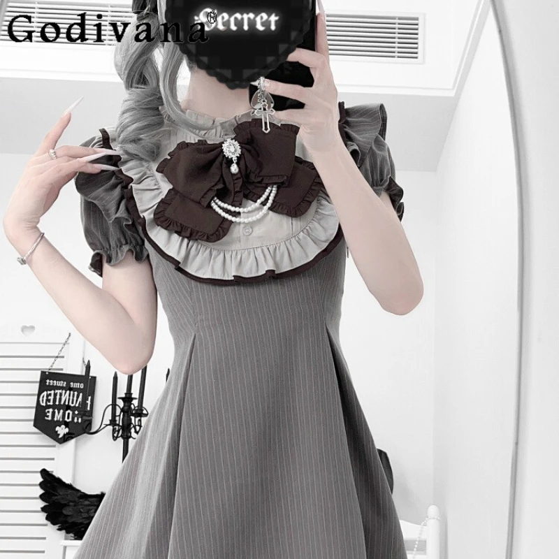 Abito stile Lolita a righe giapponesi per ragazze Abito dal design originale per sottocultura scura Abito da donna a maniche corte che impara la vita