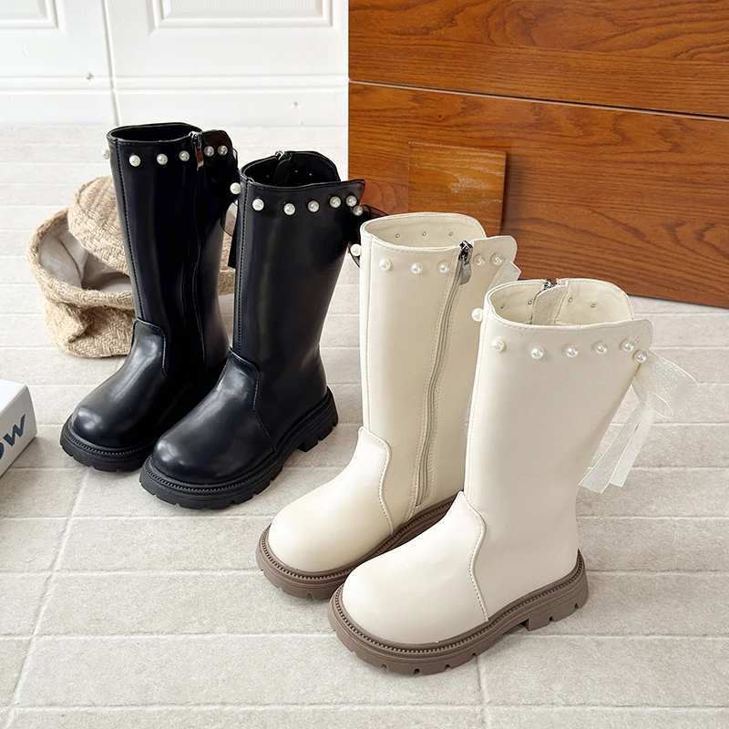 

2025 г. Детская обувь. Детские сапоги. Осень-зима. Новые модные высокие студенческие туфли длиной до колена. Кроссовки с бантом для девочек.