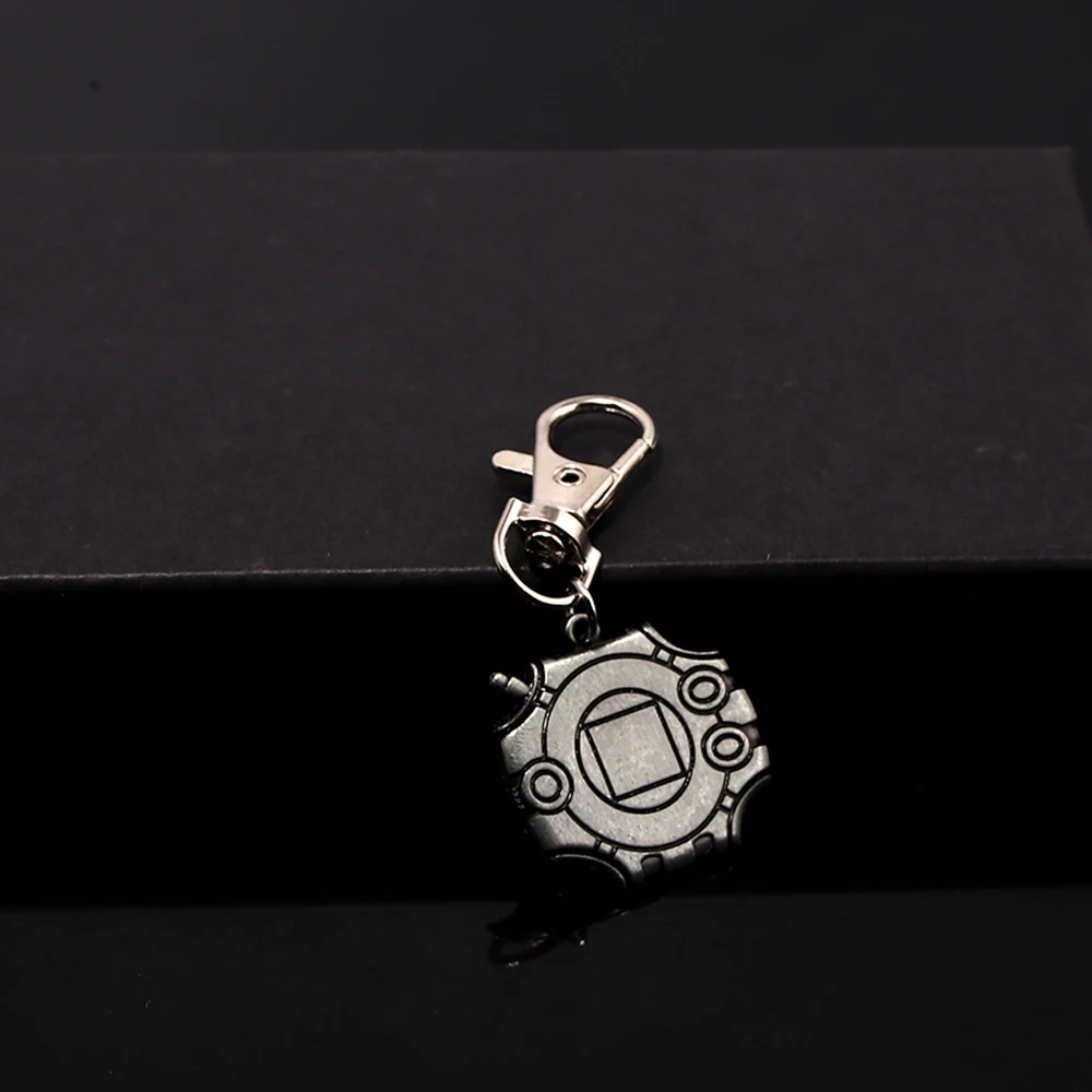Llavero inspirado en Digimon Adventure Digivice, insignia evolutiva de Gamer Vintage, accesorio genial, regalo para amigos