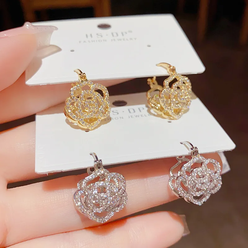 Korean Version Small Exquisite High-end Light Luxury Micro Inlaid Hollow Flowers Niche Design Earrings for Women.