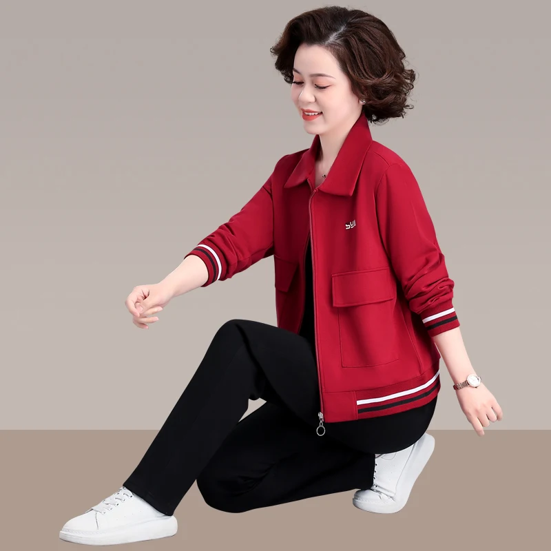 

Весенне-осенний модный спортивный костюм для мамы 50 лет: комплект из двух предметов с воротником-стойкой и длинными рукавами для женщин среднего возраста