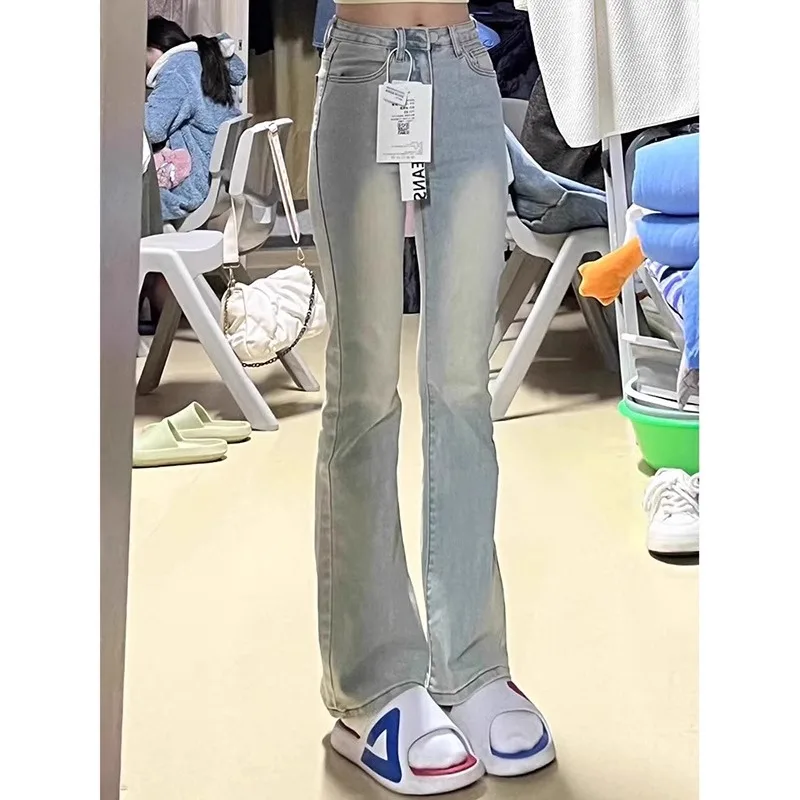 

Расклешенные джинсы с высокой талией в стиле ретро, женские осенние новые эластичные утягивающие брюки больших размеров, длинные брюки, джинсовая ткань на пуговицах C...