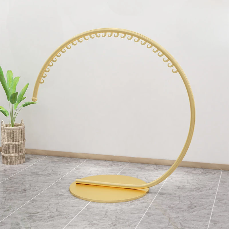 

Floor type display rack of clothing store creative gold display rack of women's clothing store clothes hanger perchero pared