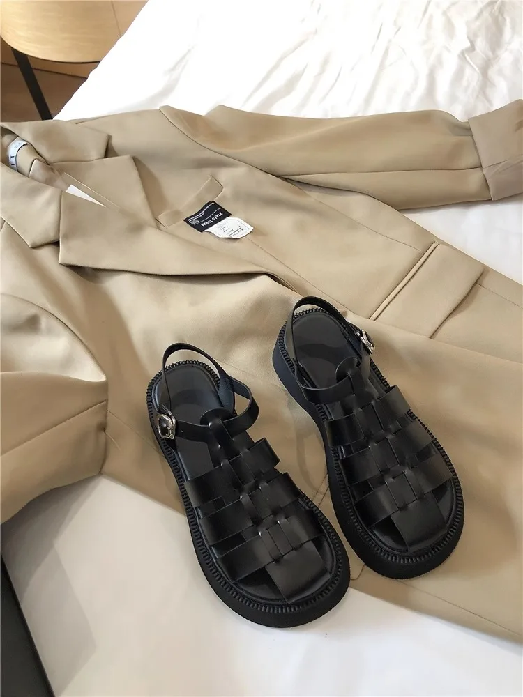 

Black Thick Bottom Woven Roman Sandals for Women Summer 2026 Fashionable Versatile Slip-On Loafers Breathable Leather Upper