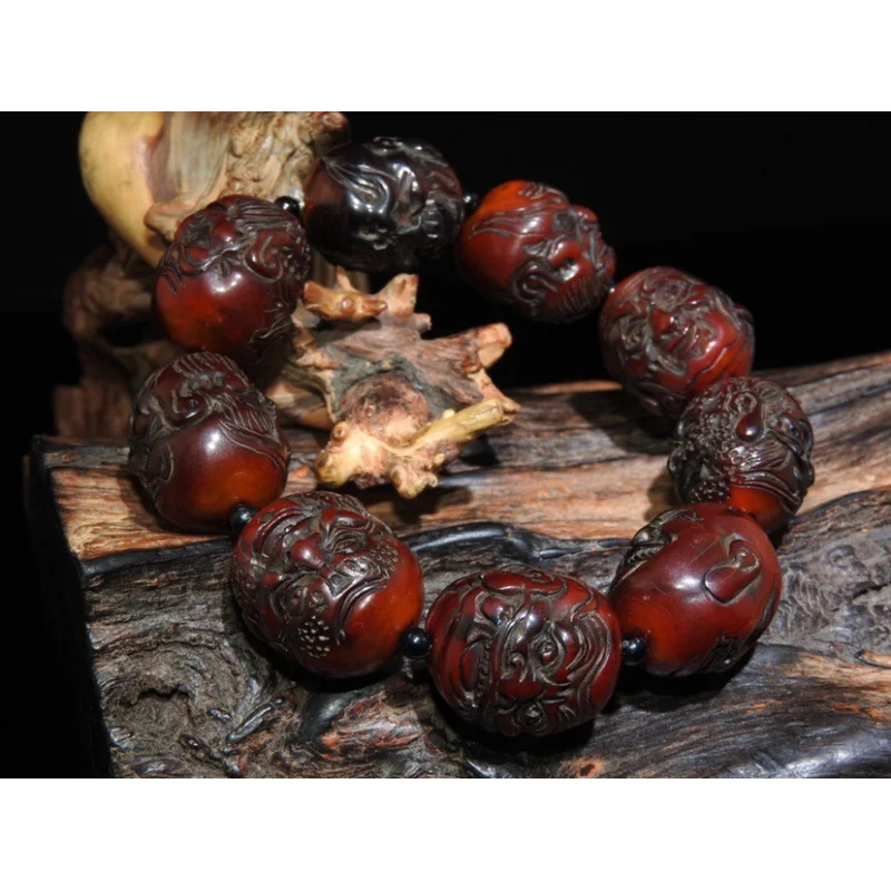 

Style Genuine Tibetan Red Old Yak Horn Double-Sided Carved Eighteen Arhats Bracelet Hand Chain Handheld