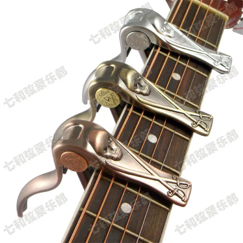 1Pcs Skull style Guitar Capo Single Handed Trigger Quick Change Tuner key Clamp for Acoustic Electric Bass Guitar 3 colors