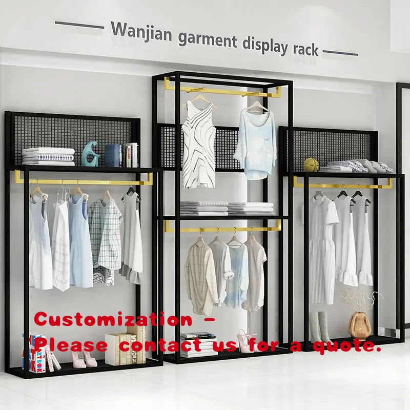 

Мебель для магазина женской одежды: Стойка-витрина для одежды из золотистой нержавеющей стали с черной сеткой для демонстрации женской одежды