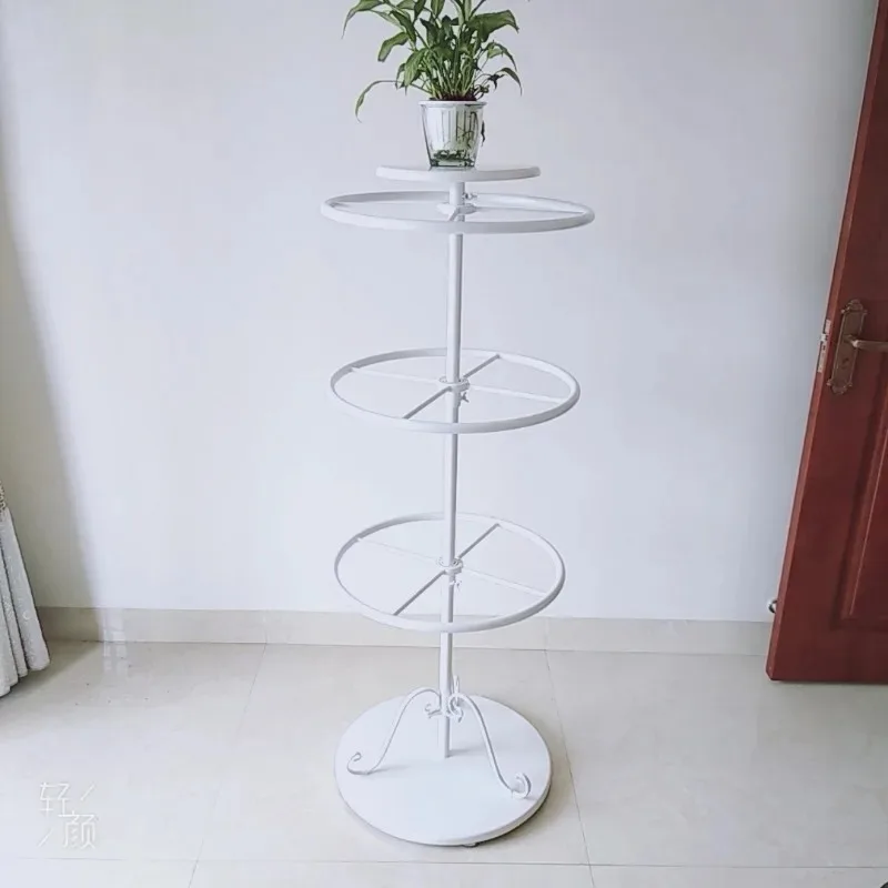 

Wrought iron floor rotating underwear underwear shelf display rack, middle island rack, round bra shelf, shorts hanger