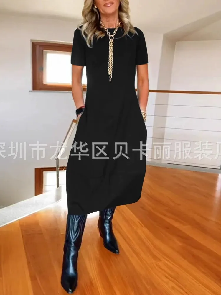 فستان نسائي صيفي جديد لعام 2025 فستان فضفاض غير رسمي بأكمام قصيرة ورقبة دائرية تي شيرت أنيق بلون واحد ملابس مكتب للسيدات