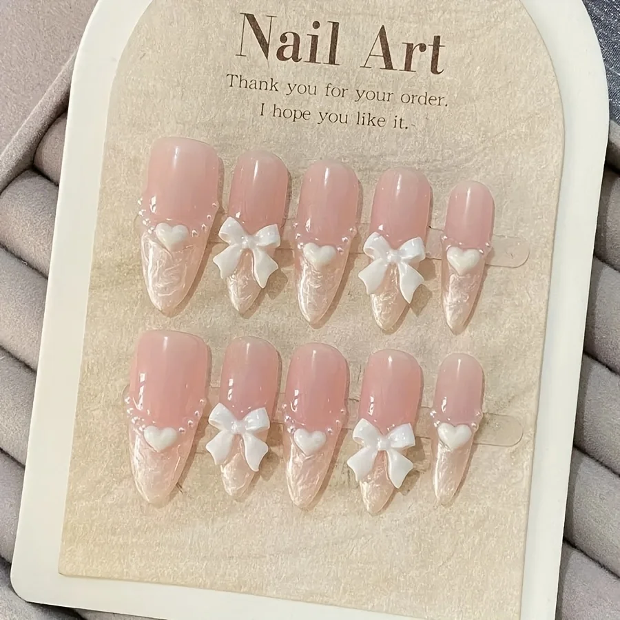 Faux ongles français haut de gamme en forme de cœur, nœud rose, faits à la main, patchs pour ongles 