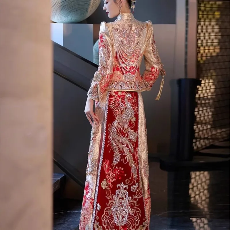 New Chinese-style dragon and phoenix wedding dress in champagne color from Heavy industry