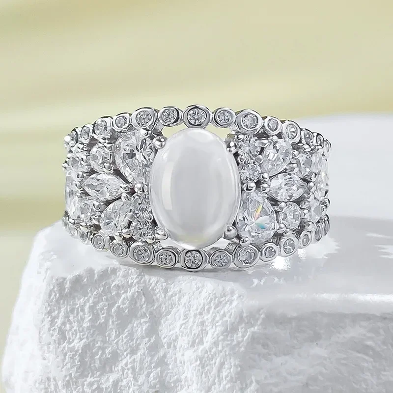 

Karachi New French Luxury Ins Style Pure Silver Hollow Foam Jade 6*8 Ring New Chinese Egg Face Ring With Diamonds Jewelry