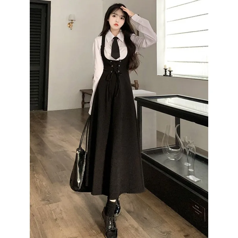 Japanese College Wind Waist Slim Strap Dress Female INS Personality Fashion Niche Design Sense Joker gonna lunga allentata con bretelle