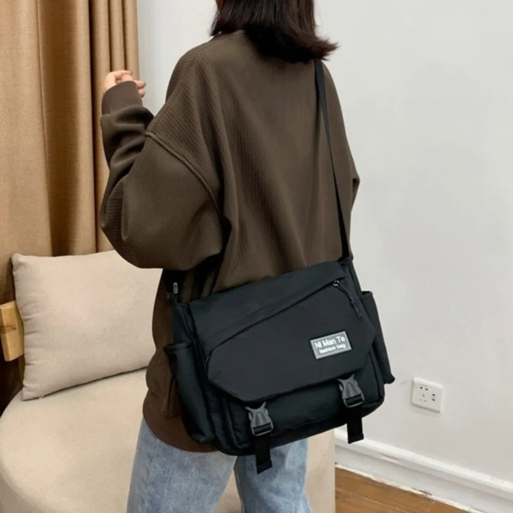 

Fashion Large Capacity Nylon Messenger Bag Korean Style Multi Pocket Women Shoulder Bag Sling Flip Cover Mailman Bag Outdoor