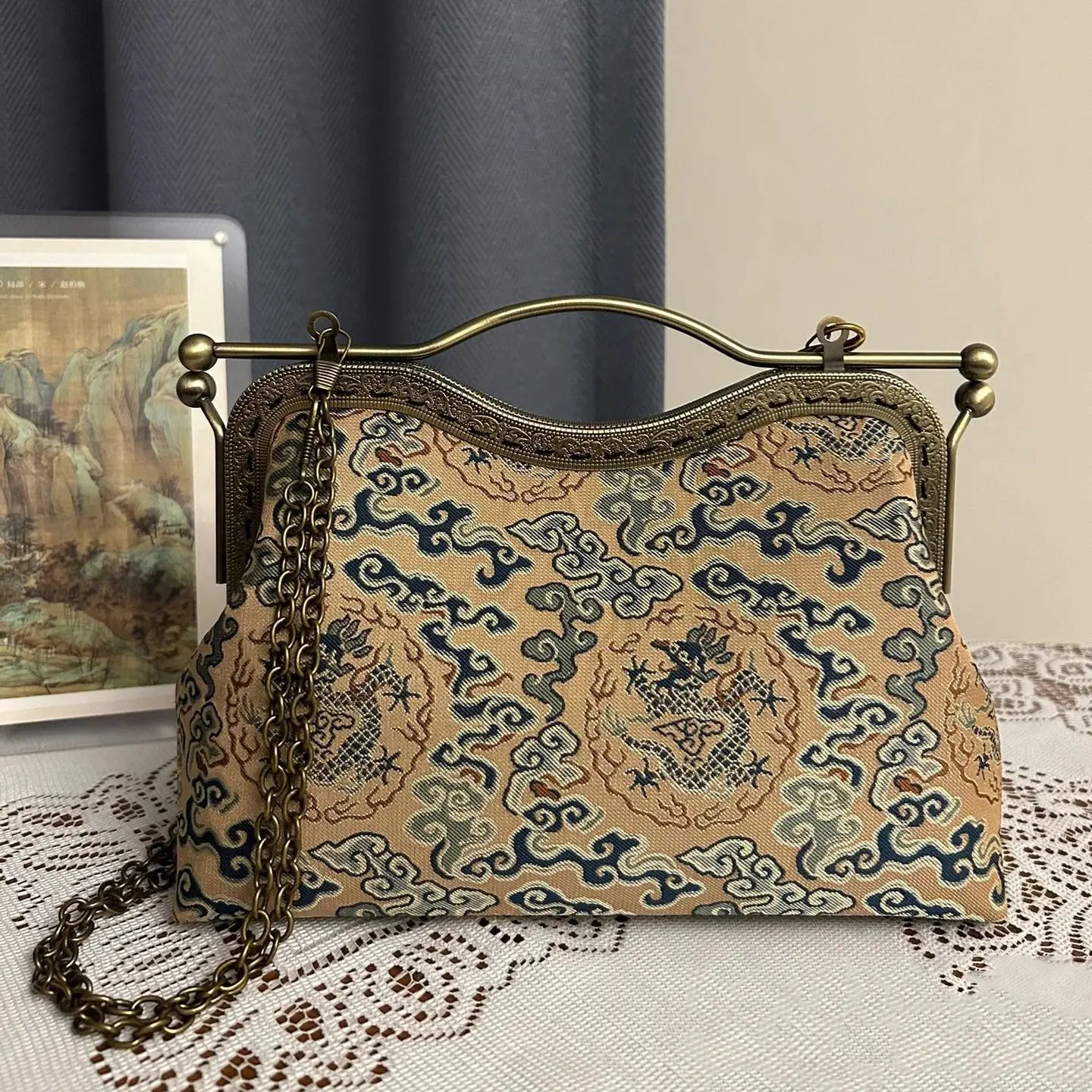 Lost in Vintage Exquisite Clutch Features an Ornate Tapestry Fabric that Boasts a Rich Display of Geometric and Floral Motifs