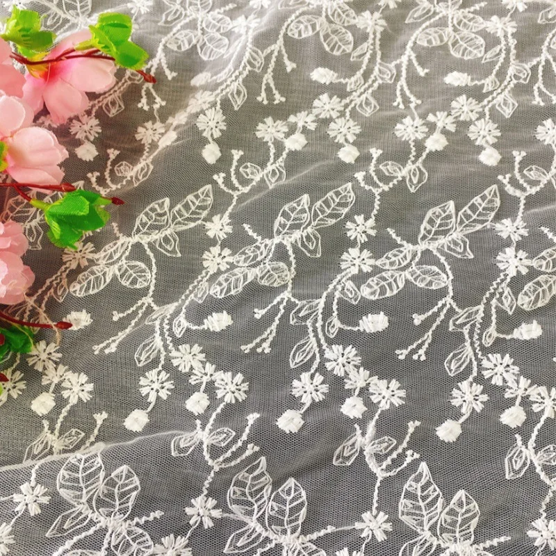 

High-quality milk silk lace embroidered floral mesh fabric for wedding dresses, embroidered fabric sold by the yard